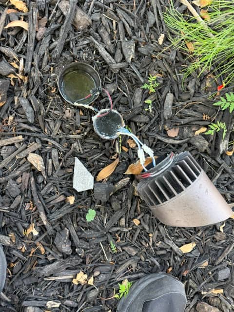 Landscape lighting fixture housing filled with standing water due to poor sealing