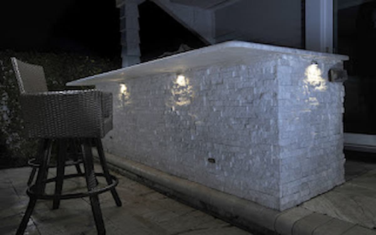 Directional spotlight uplighting on tree by Luna Vista Exterior Lighting