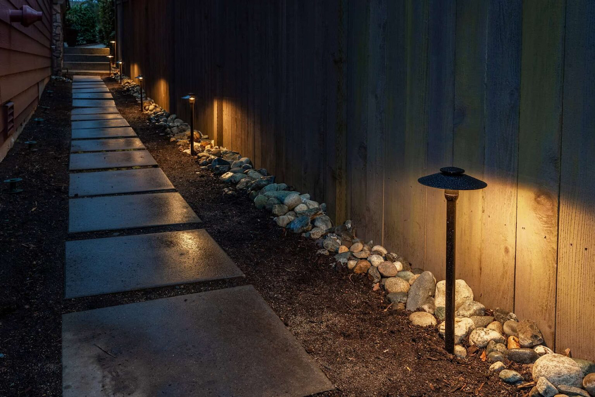 P14 Path Light installed along a stone walkway
